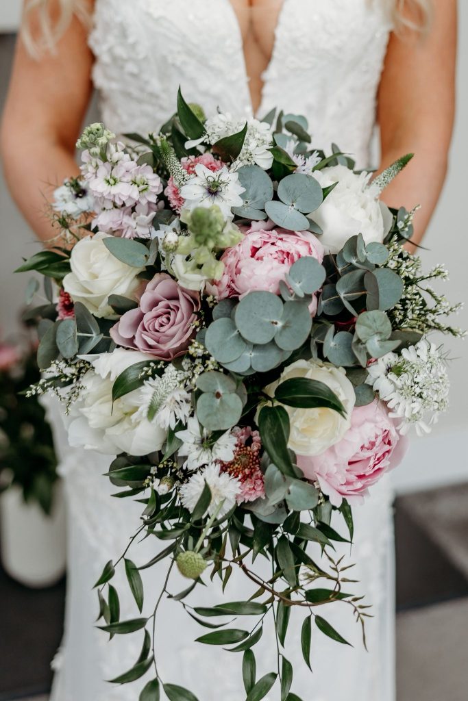 Pale pinks and white bridal bouquet close up by The Flowers of May